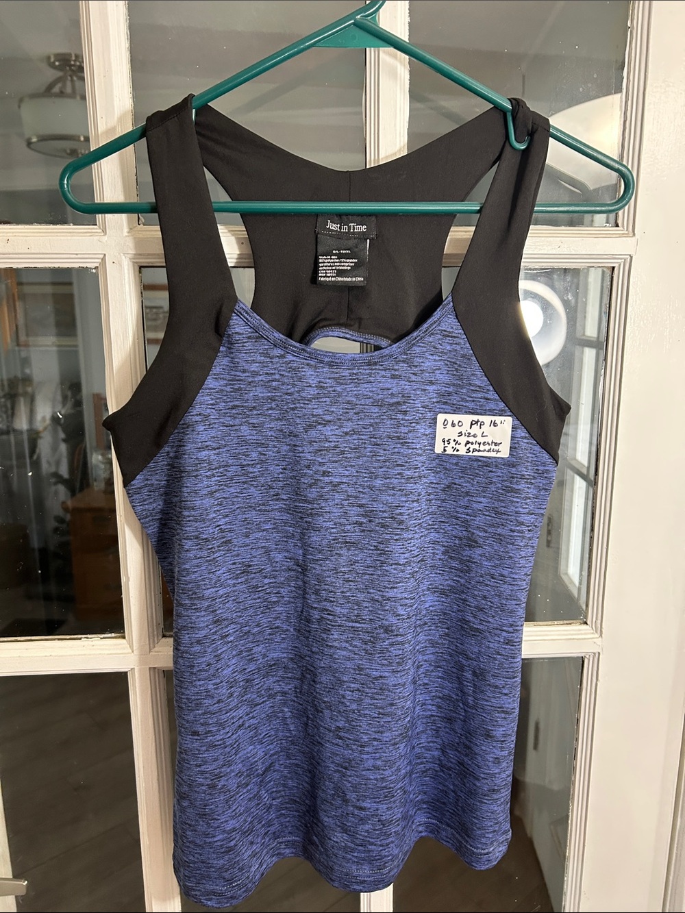 O60.   Just in Time Women’s Blue & Black Muscle Tank